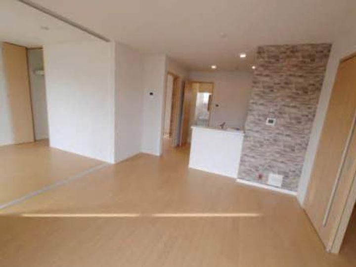 福岡県北九州市若松区ひびきの南2丁目の賃貸アパートの居間