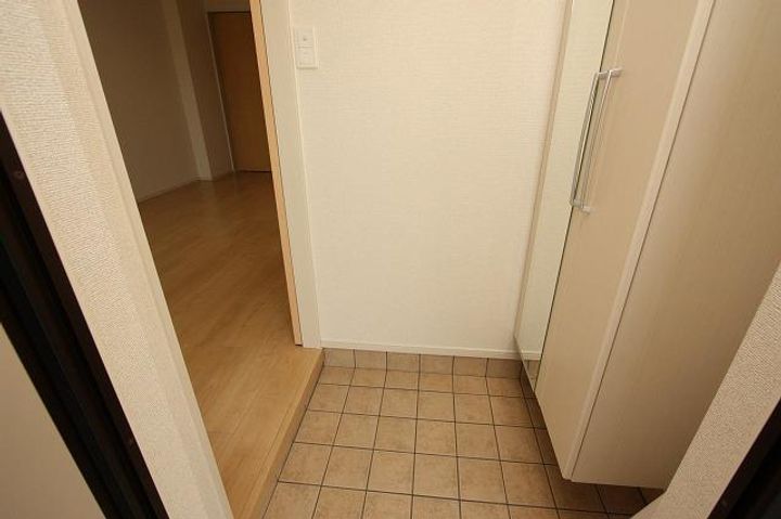 ソレアード カーサの玄関