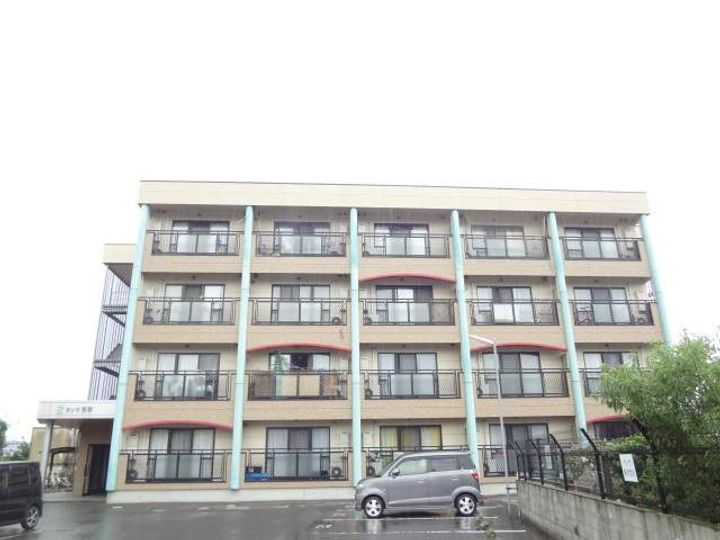 ハーモニーKハウスサンワ前原411号室の外観