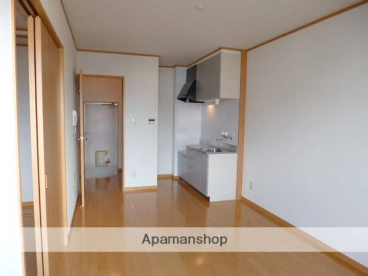 サンリバー大石102の居間