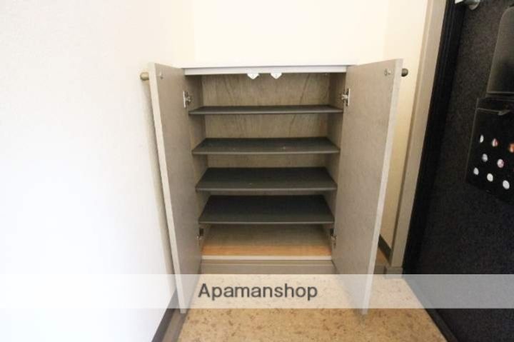 ハミングタウン合川D-103の玄関