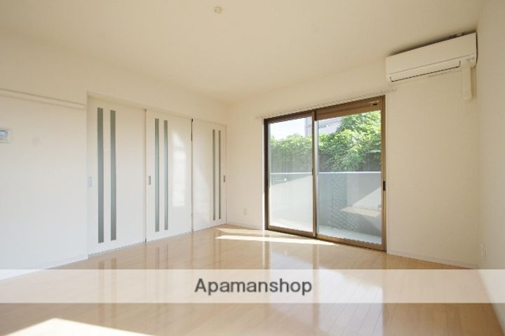 熊本県熊本市東区下南部3丁目の賃貸マンションの居間