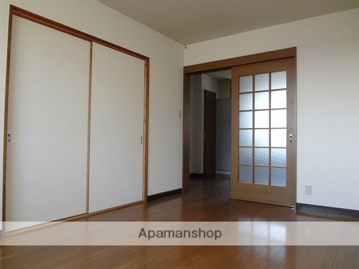 熊本県熊本市西区春日7丁目の賃貸アパートの居間