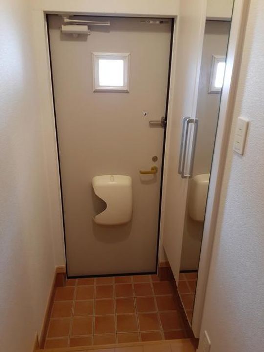 カームリー メゾンの玄関