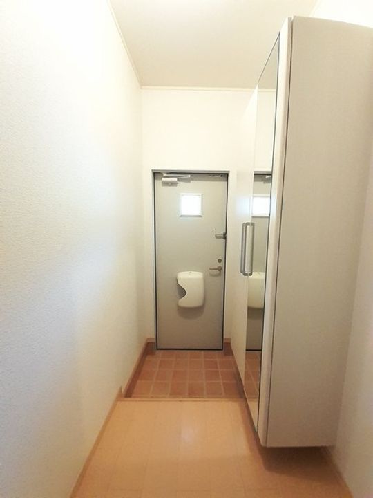 グローリーラビーンAの玄関