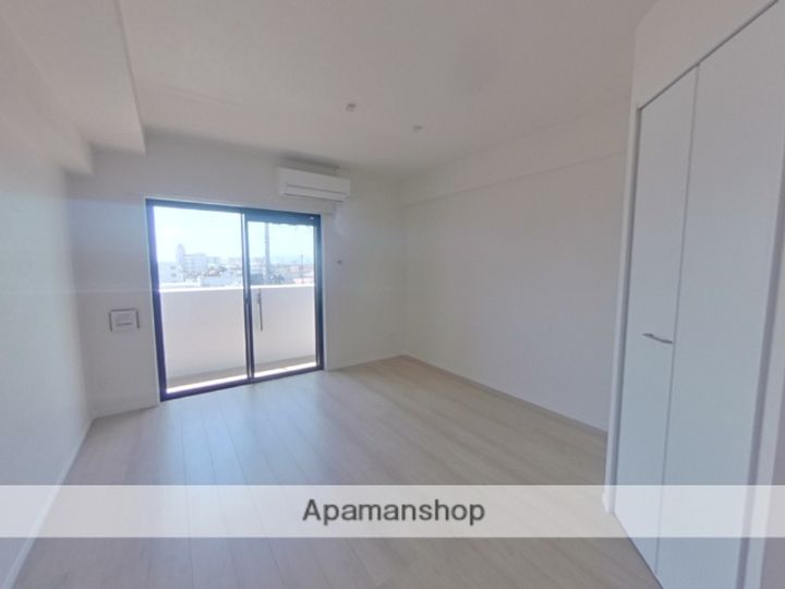 熊本県熊本市西区春日7丁目の賃貸マンションの居間