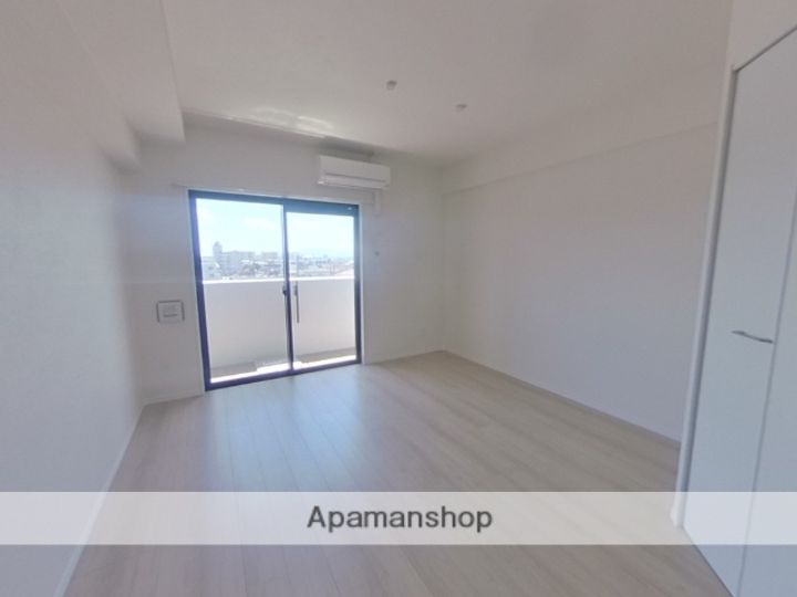 熊本県熊本市西区春日7丁目の賃貸マンションの居間