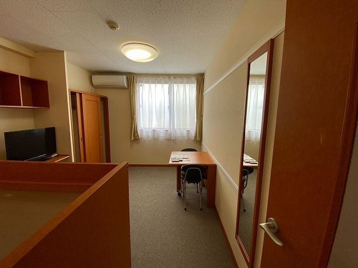 レオパレスフローラル合志館109の居間