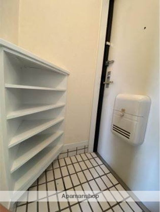 熊本県熊本市中央区黒髪2丁目の賃貸マンションの玄関