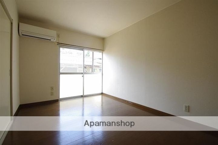 熊本県熊本市中央区薬園町の賃貸アパートの居間