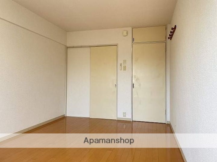 ロイヤルハイツ池田306の居間