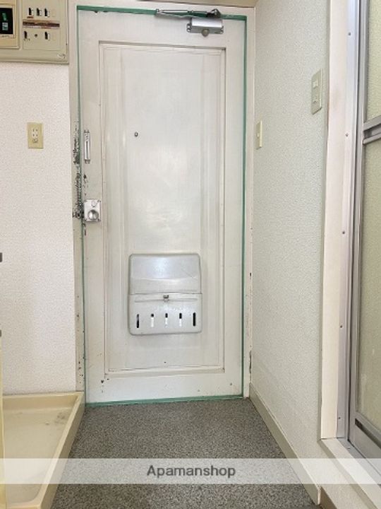 ロイヤルハイツ池田214の玄関