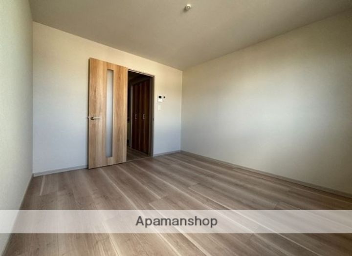 大分県大分市大字旦野原の賃貸アパートの居間