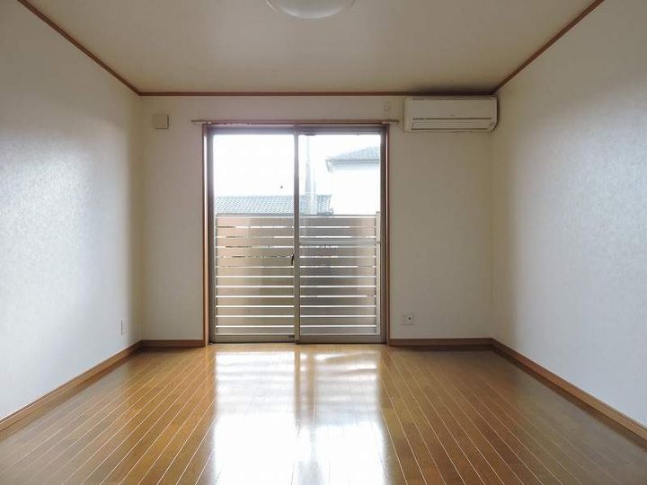 宮崎県えびの市大字上江の賃貸アパートの居間