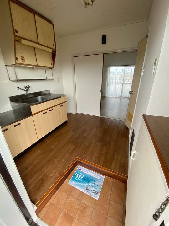 コーポ泉ヶ丘303の玄関