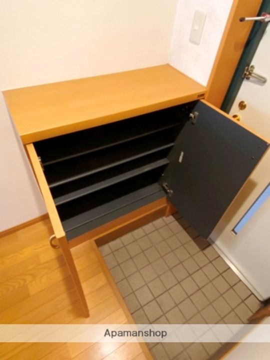 コンフォール上荒田の玄関