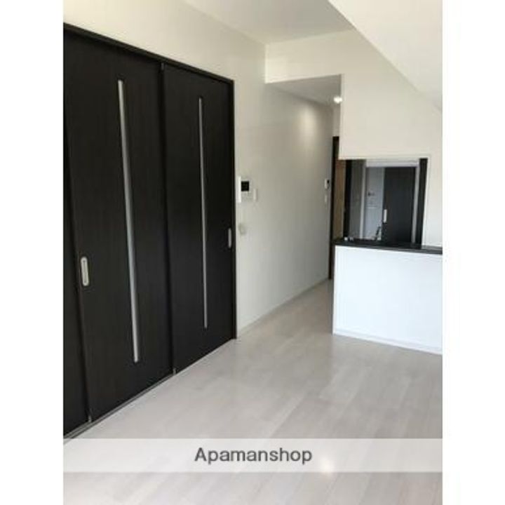 メゾン・ド・ソレイユ西千石1205の居間