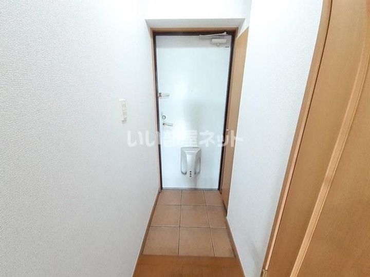 京都府宇治市大久保町上ノ山の賃貸マンションの玄関