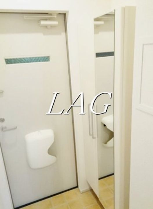 Tフラッツ富久町の玄関