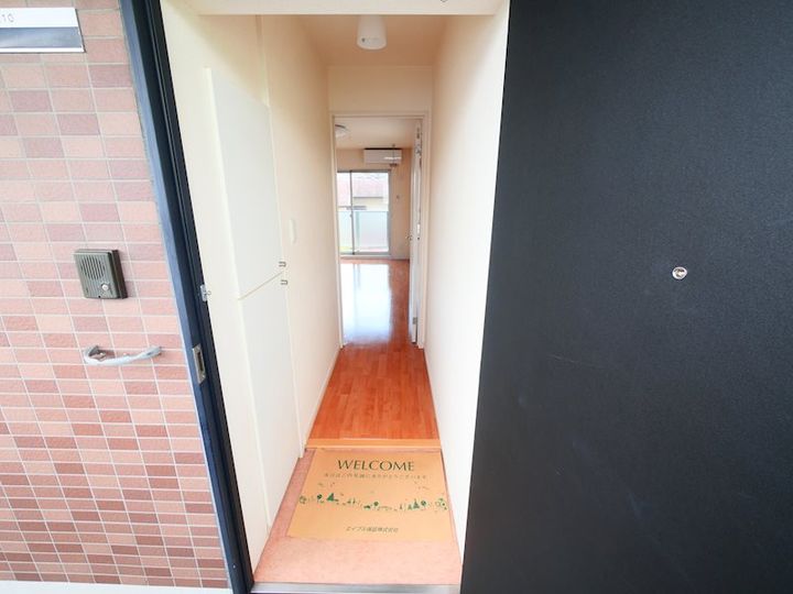 埼玉県草加市北谷1(マンション)の賃貸物件の玄関