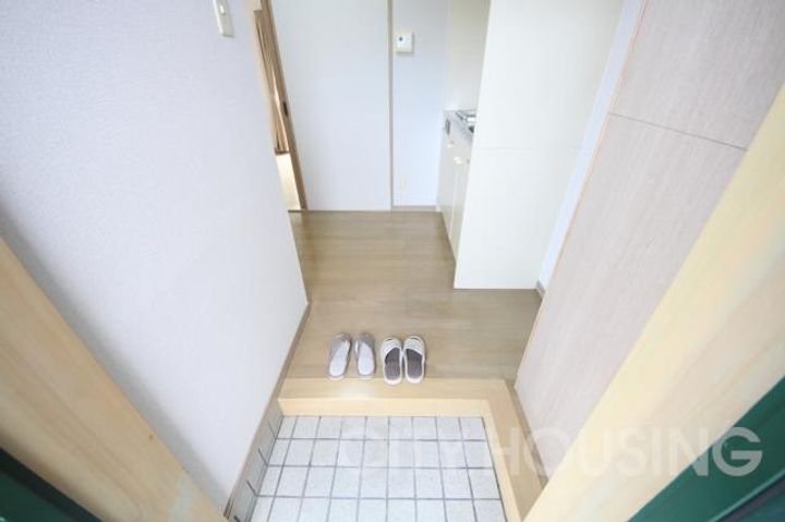 メゾン花の玄関