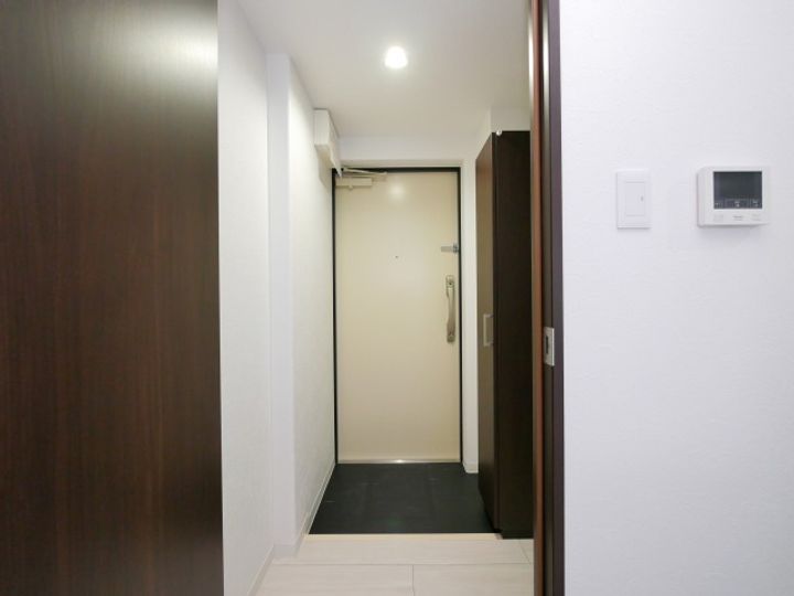 プライムコート麻生駅前の玄関