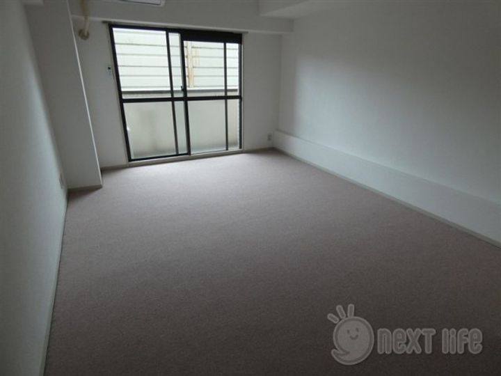 アカデミー・グローリア初穂町田合同ビルの居間