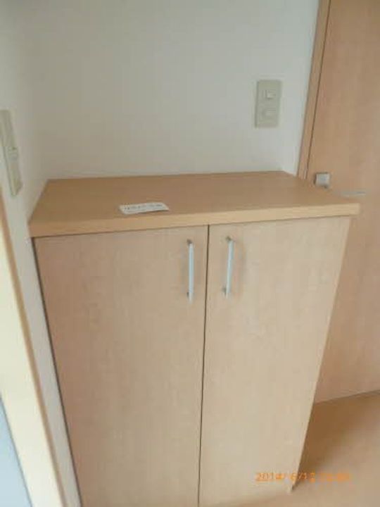 メルベーユ飯盛の玄関