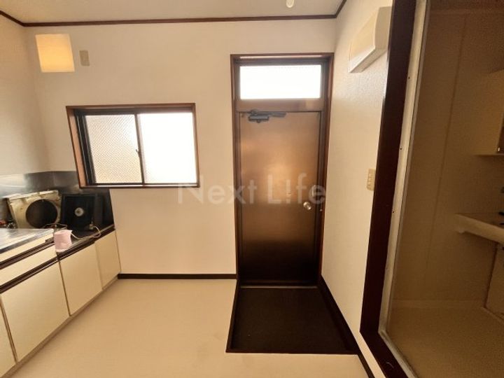 コンフォート イナギの玄関