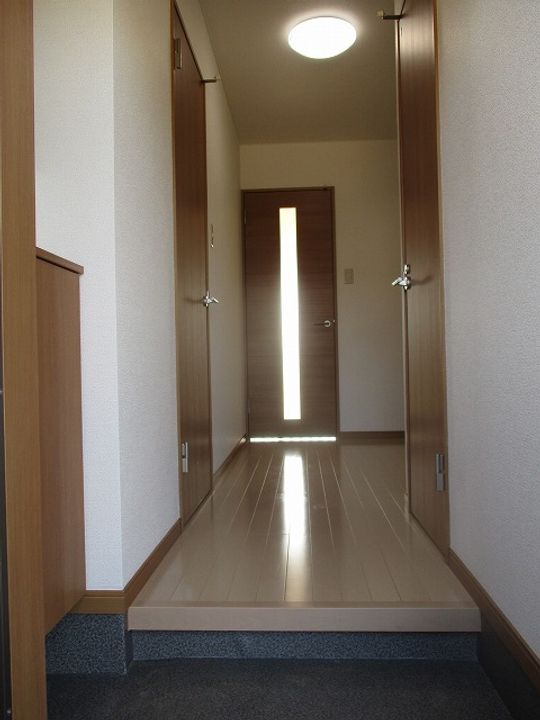 レックマンション新品治B棟の玄関