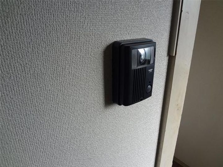 富田町コーポ(西側)の玄関