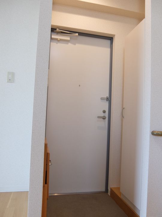 ハーベストマンションの玄関