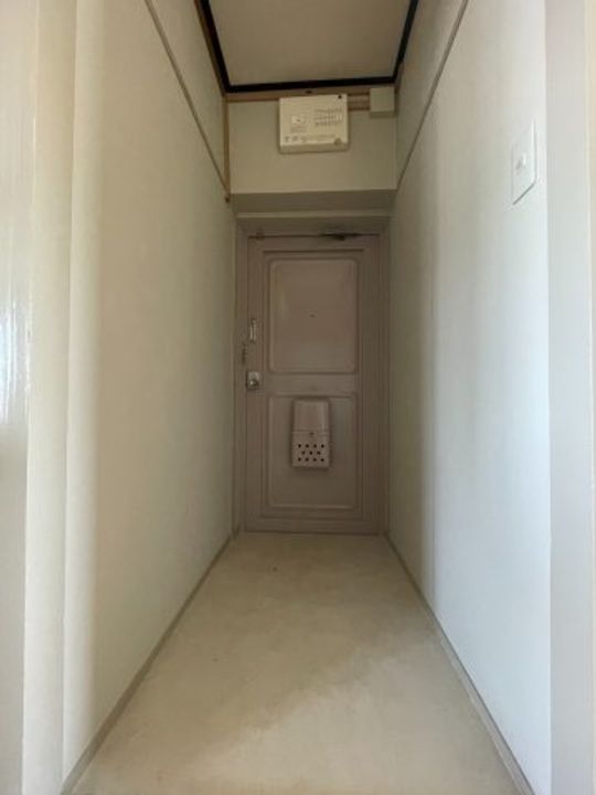 公社賃貸SMALIO 香里三井Bの玄関