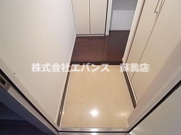 アルコバレーノシンメイの玄関