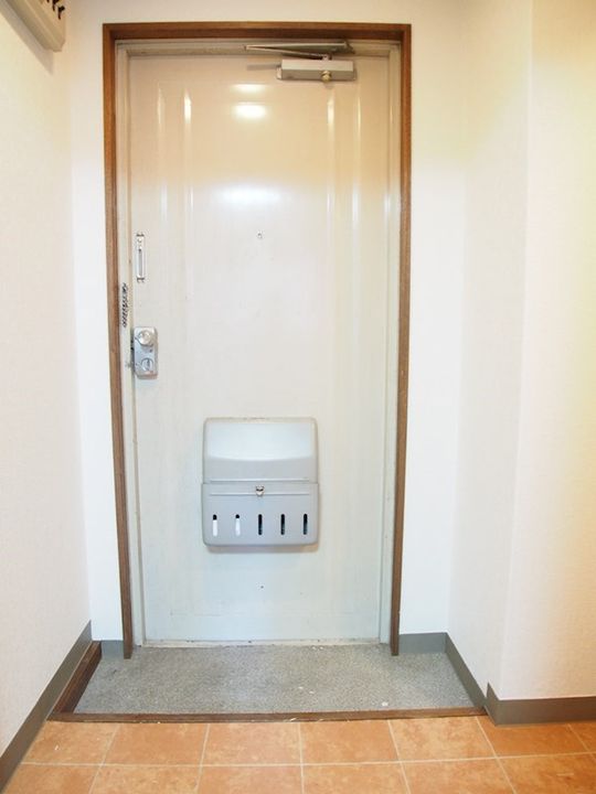フレンドハイツ城北の玄関