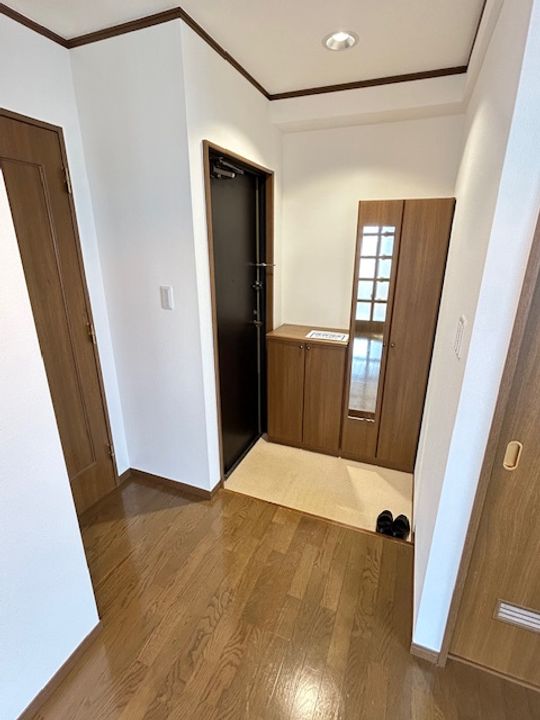 ファミーユ七(セブン)の玄関