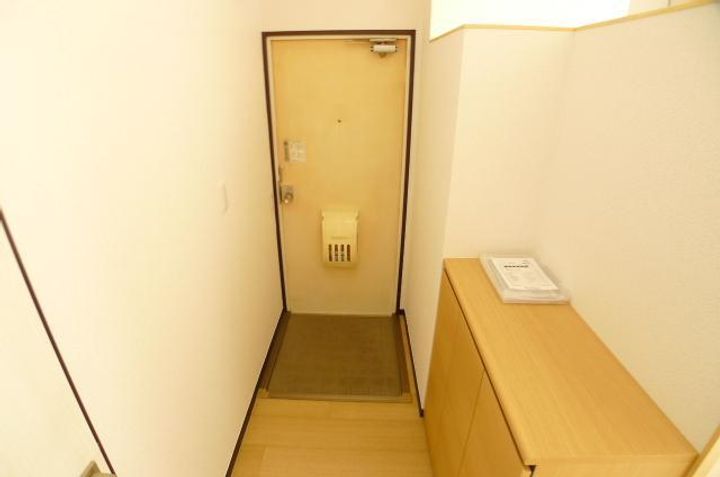 アーバン旭豊四季の玄関