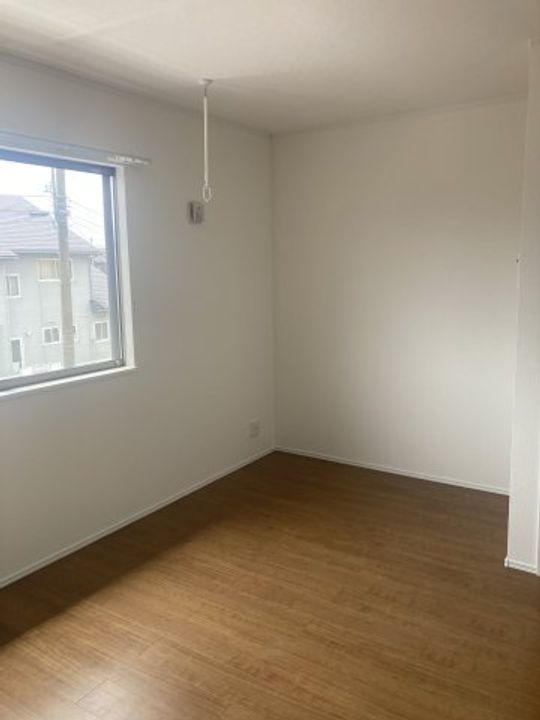 ワンリッチ上野町Aの居間