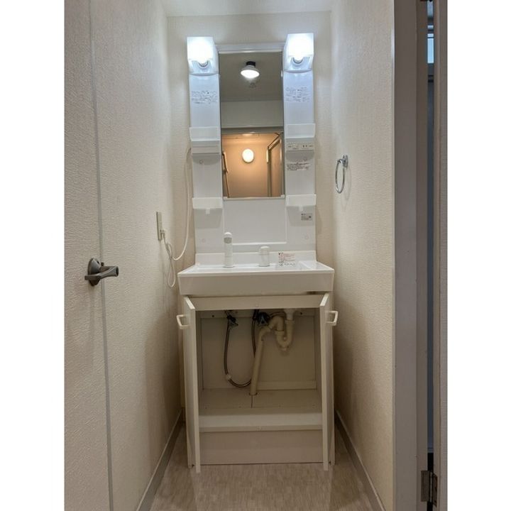 ブルーベイhonjo3の玄関