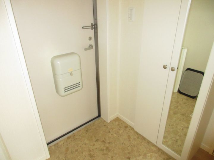 サニーヒルズ シンエイの玄関