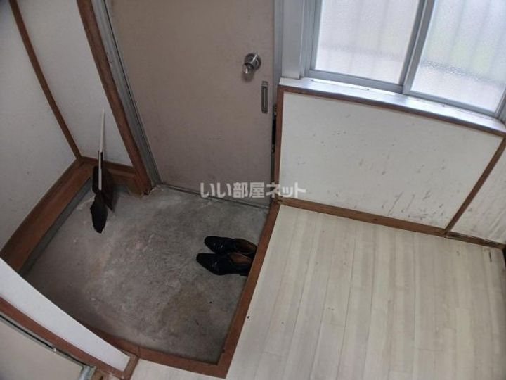 三重県名張市蔵持町芝出(マンション)の賃貸物件の玄関