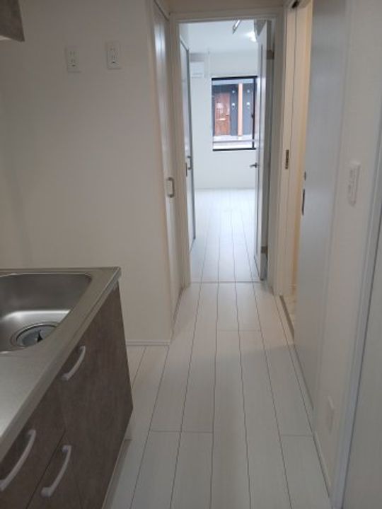 胆沢郡金ケ崎町西根杉土手【ワンリッチ金ヶ崎B】新築の玄関