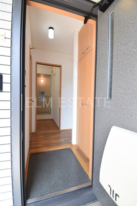 シャルム Wの玄関