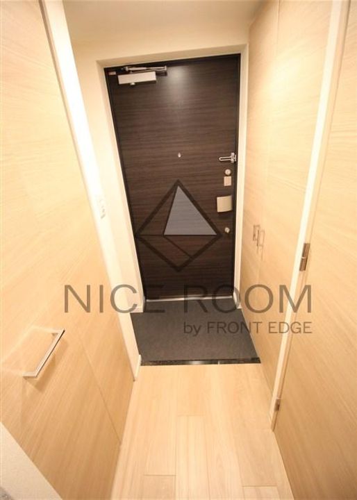 プレサンス玉造駅前ルージュの玄関