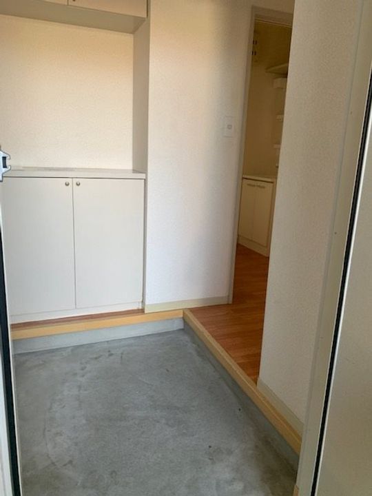 フレグランスウズキの玄関