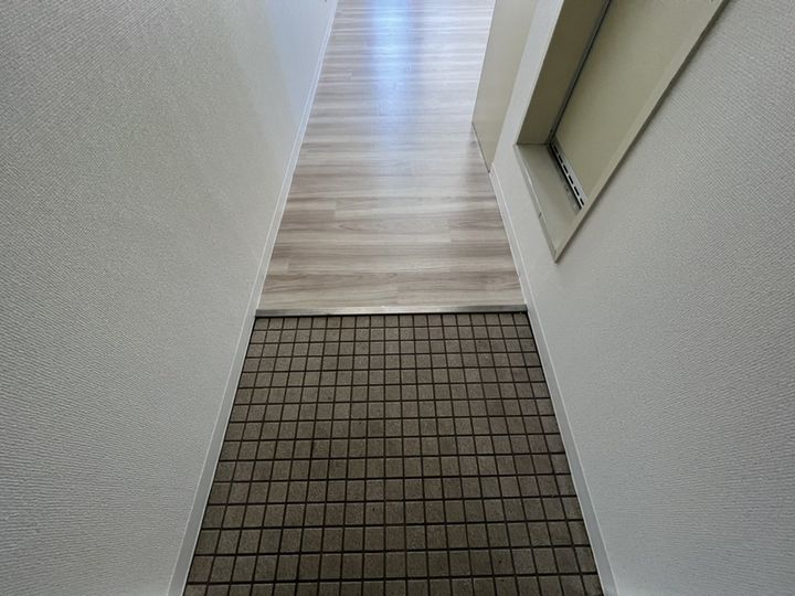 プチメゾンSENBAの玄関