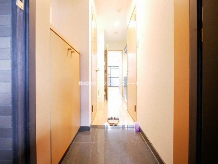 ジュネーゼ梅田北プラウディアの玄関