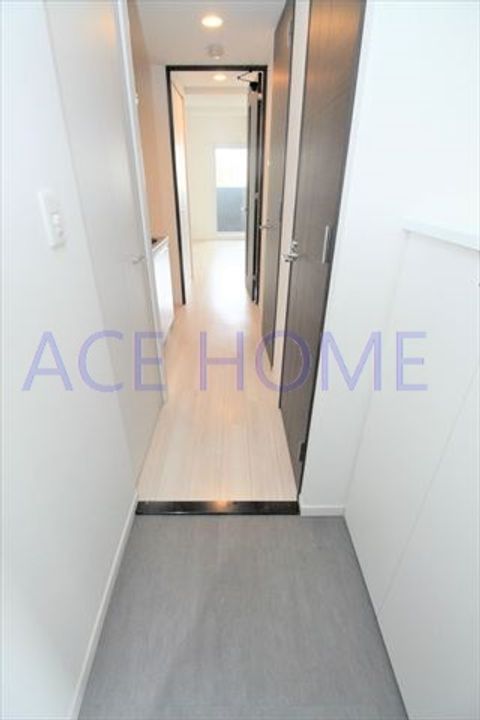 レジュールアッシュ上町台の玄関