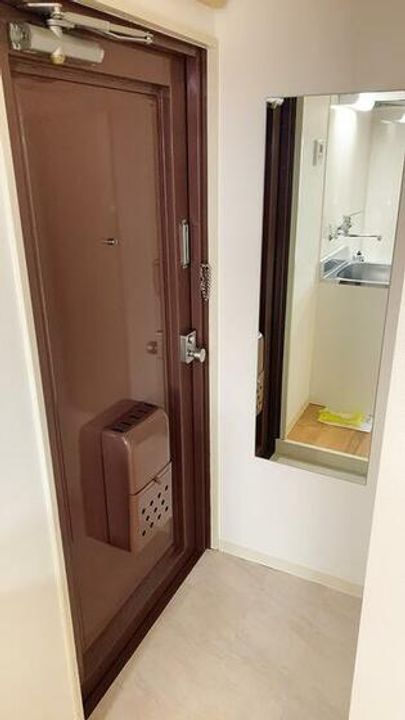 レオドラード飯塚の玄関