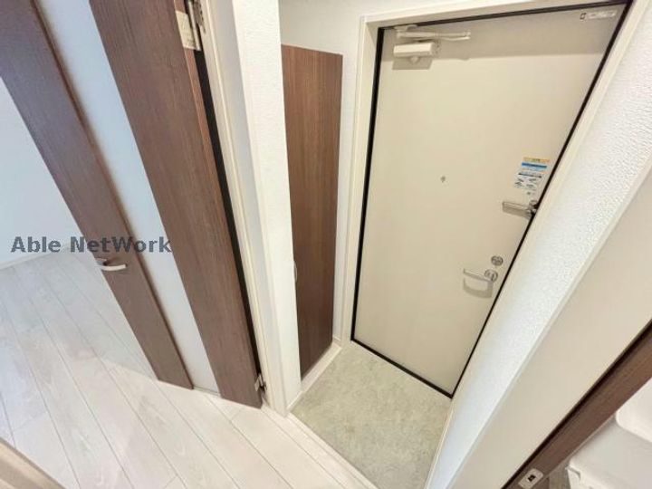 メゾンクレール長嶺南の玄関